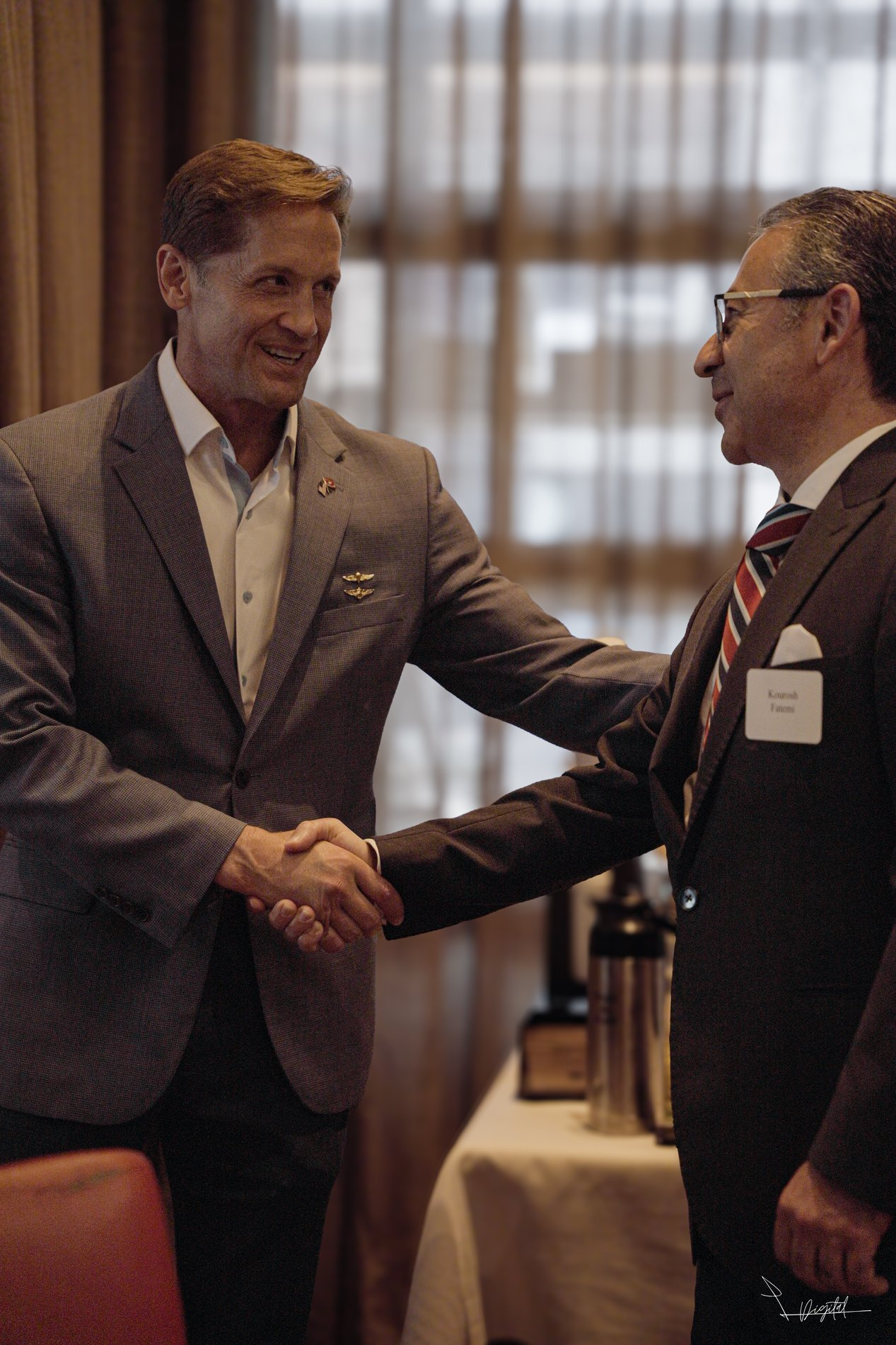 Congressman Rich McCormick greeting PACCSE President Kourosh Fatemi